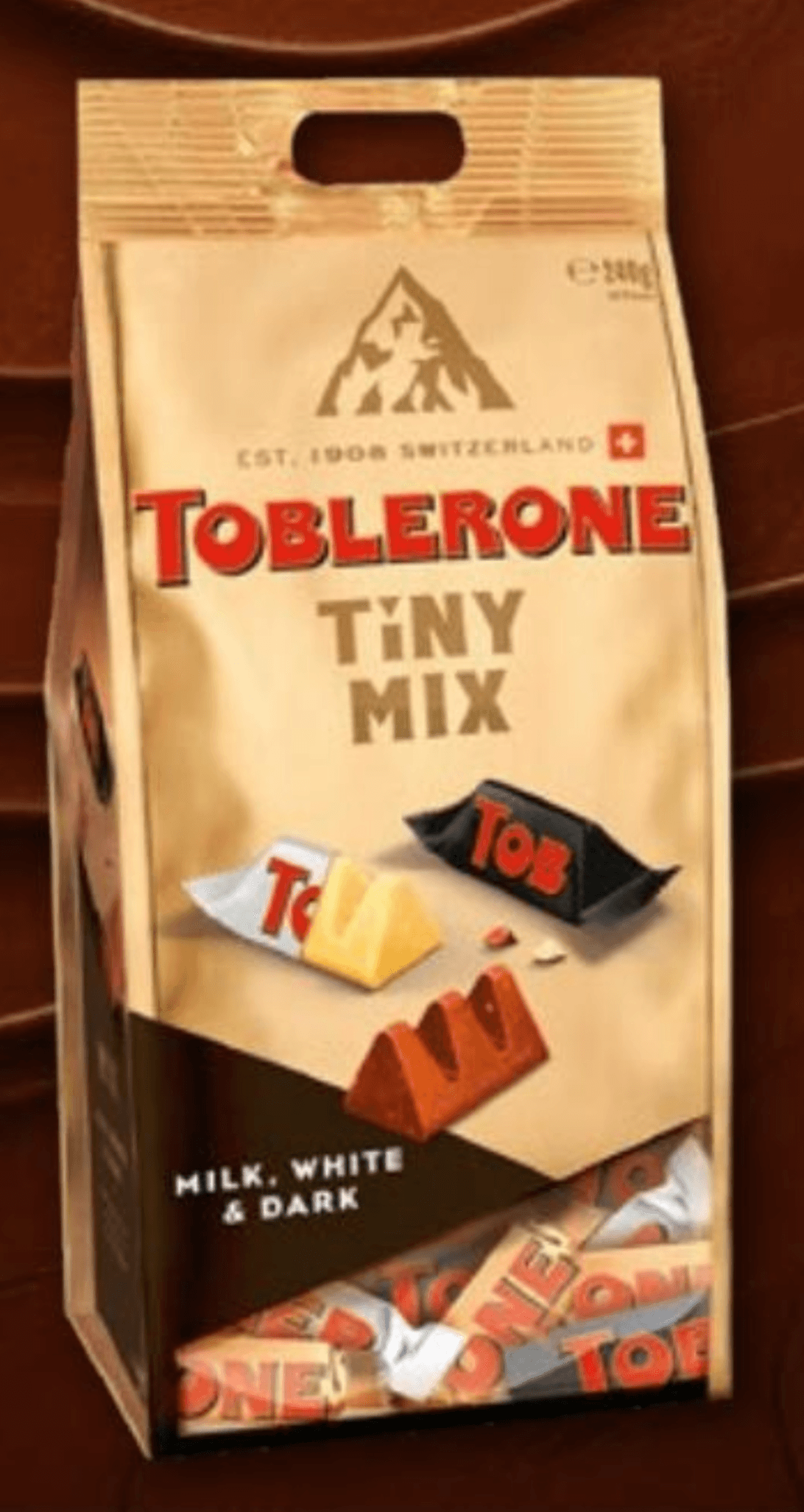 TOBLERONE Tiny mlečna čokolada z medom in mandljevim nugatom 240 g - Akcija v trgovini Kompas Shop